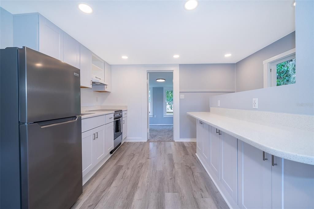 Interior, Kitchen, Recessed Lighting, Stainless Steel Appliances, Wood Texture Flooring