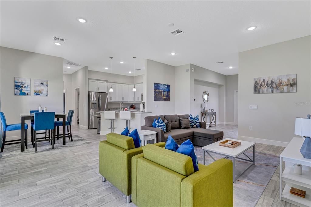 Dining room, Interior, Kitchen, Living room, Pendant Lights, Recessed Lighting, Stainless Steel Appliances, Wood Texture Flooring