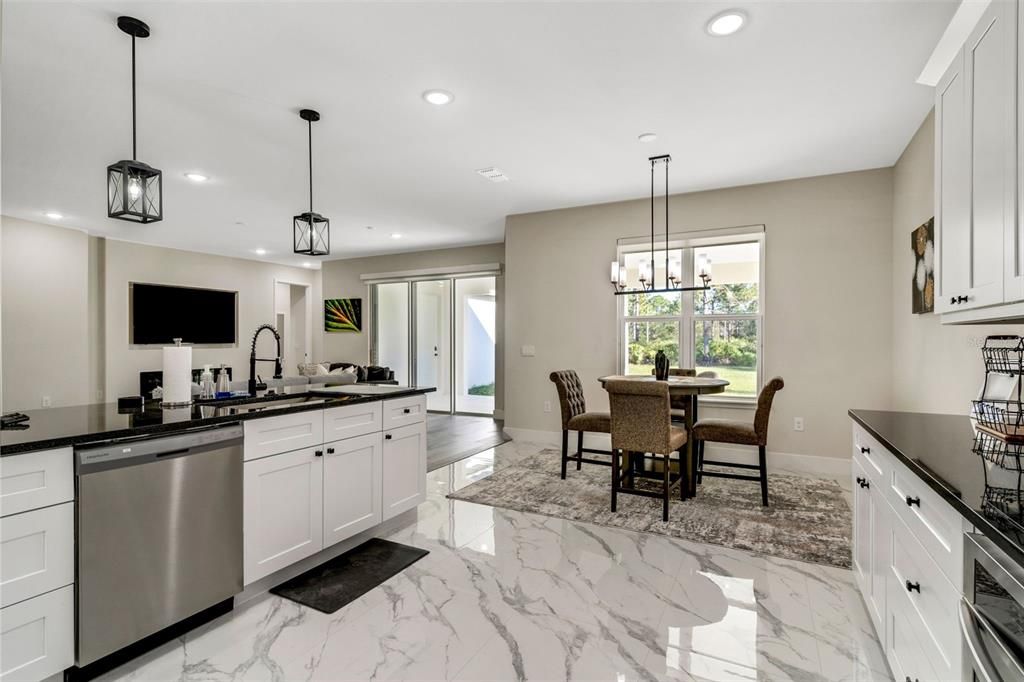 Dining room, Interior, Kitchen, Marble, Pendant Lights, Recessed Lighting, Stainless Steel Appliances