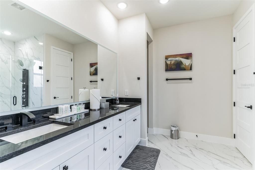 Bathroom, Dual Sink Vanities, Interior, Marble, Marble Walls, Recessed Lighting