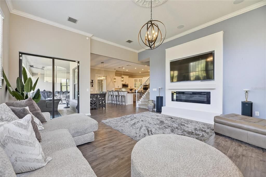 Fireplace, Interior, Kitchen, Living room, Pendant Lights, Recessed Lighting, Wood Texture Flooring