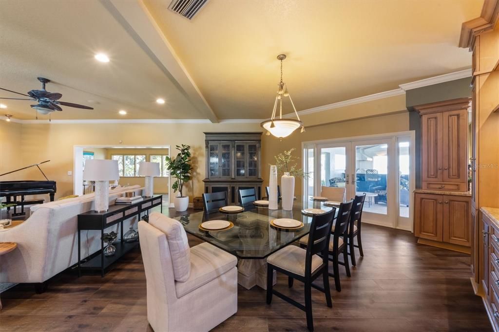 Dining room, Interior, Living room, Pendant Lights, Piano, Recessed Lighting, Wood Texture Flooring
