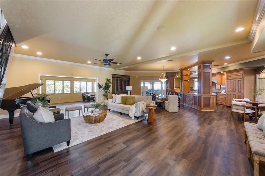 Dining room, Interior, Kitchen, Living room, Pendant Lights, Piano, Recessed Lighting, Wood Texture Flooring