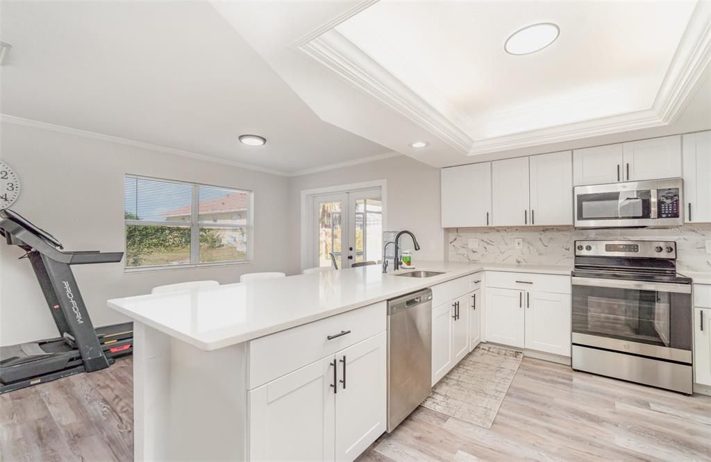 Interior, Kitchen, Recessed Lighting, Stainless Steel Appliances, Wood Texture Flooring