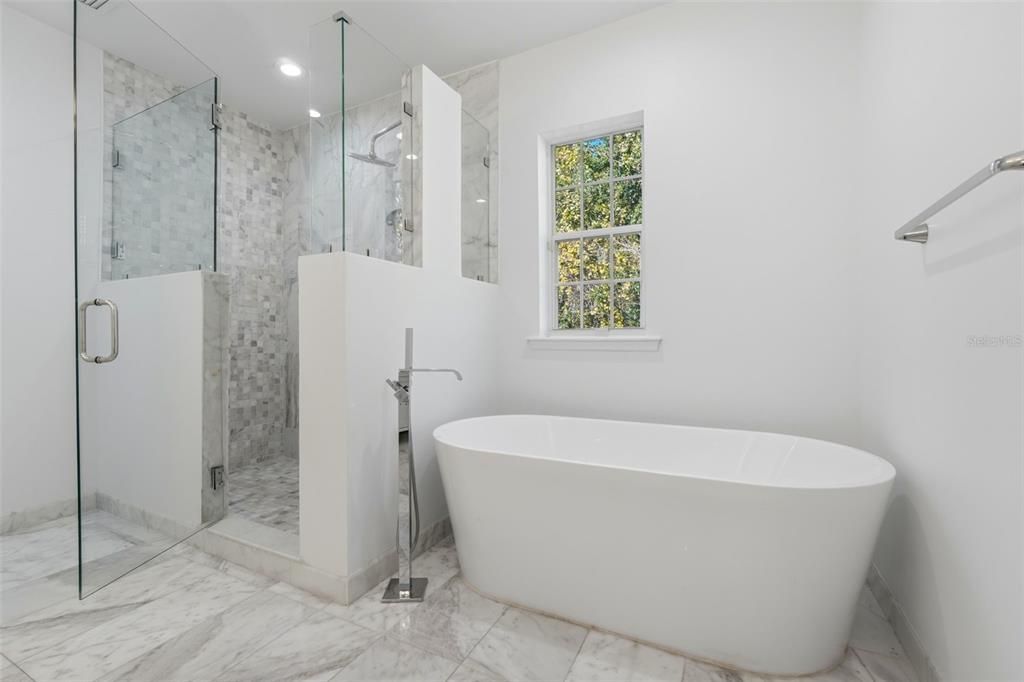 Bathroom, Free Standing Baths, Glass Shower, Interior, Marble, Marble Walls, Recessed Lighting