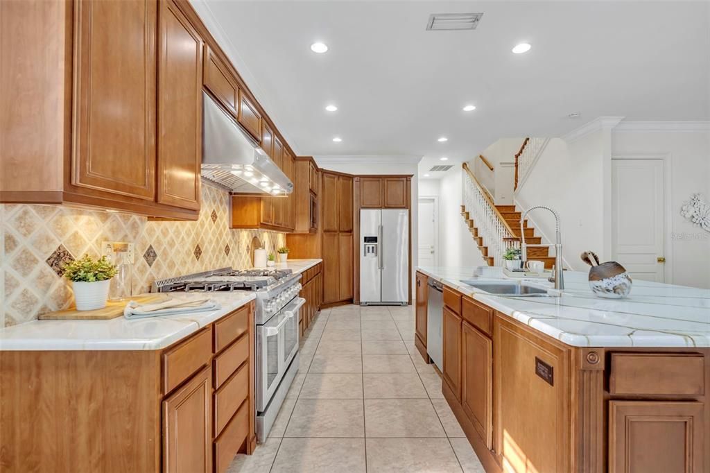 Interior, Kitchen, Recessed Lighting, Stainless Steel Appliances, Tile Countertops