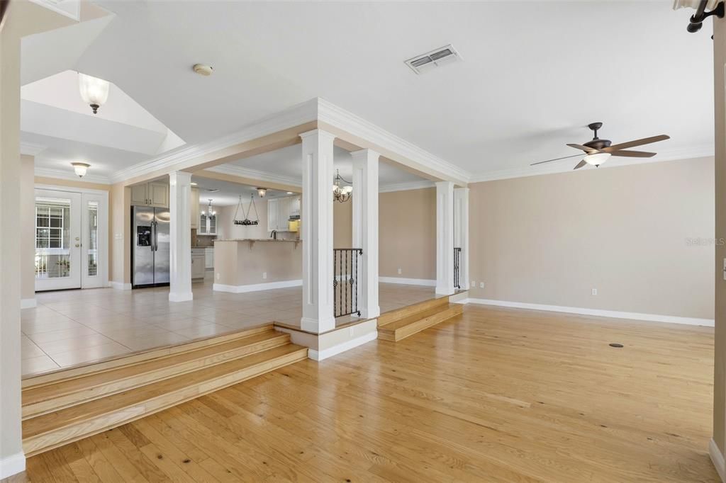 Empty room, Interior, Kitchen, Pendant Lights, Stainless Steel Appliances, Wood Texture Flooring