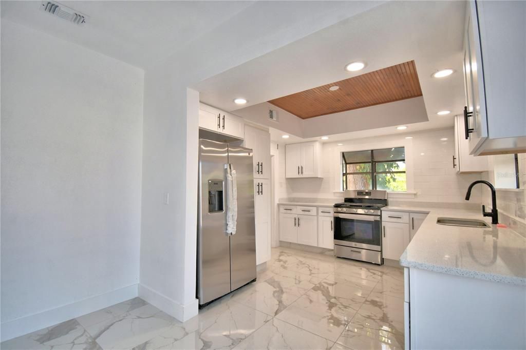 Interior, Kitchen, Marble, Recessed Lighting, Stainless Steel Appliances, Wooden Ceilings