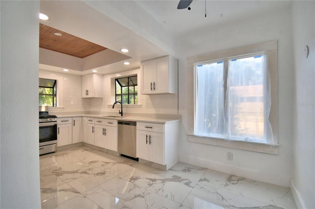 Interior, Kitchen, Marble, Recessed Lighting, Stainless Steel Appliances, Wooden Ceilings