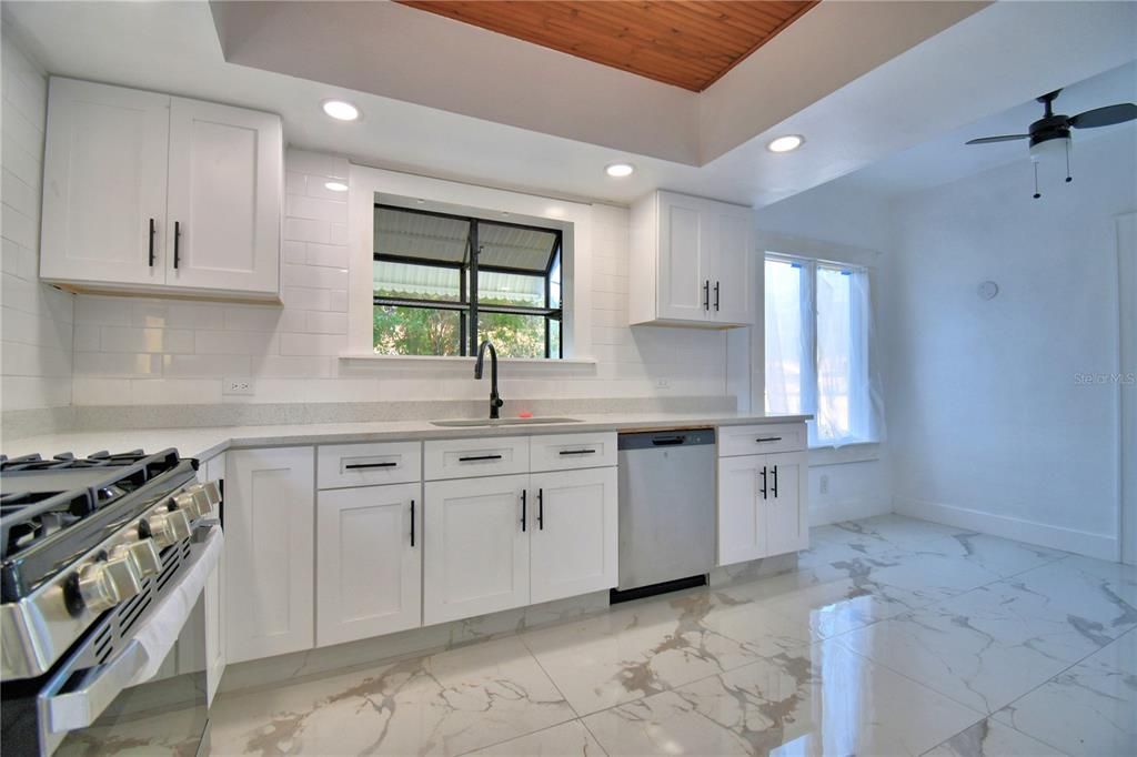 Interior, Kitchen, Marble, Recessed Lighting, Stainless Steel Appliances, Wooden Ceilings