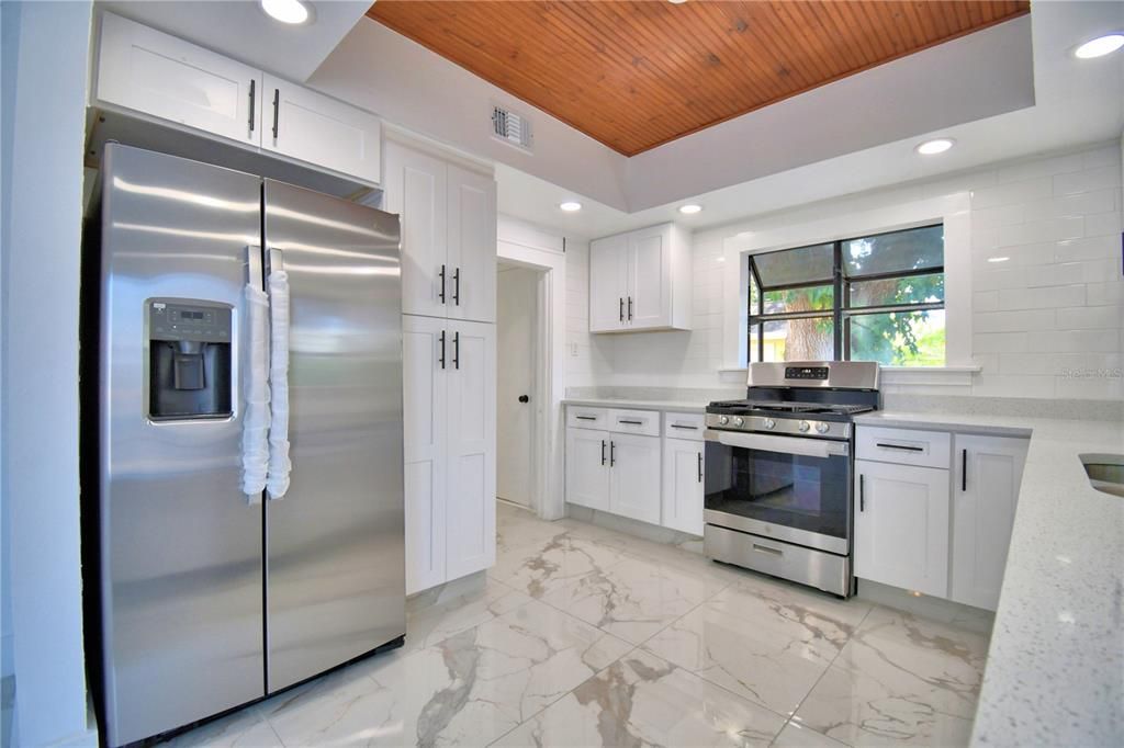 Interior, Kitchen, Marble, Recessed Lighting, Stainless Steel Appliances, Wooden Ceilings