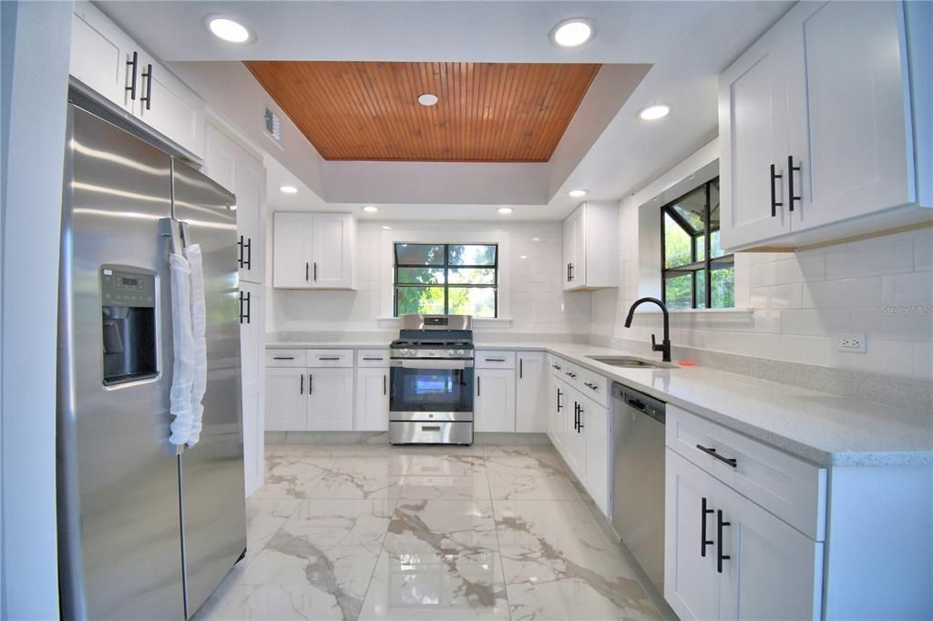 Interior, Kitchen, Marble, Recessed Lighting, Stainless Steel Appliances, Wooden Ceilings