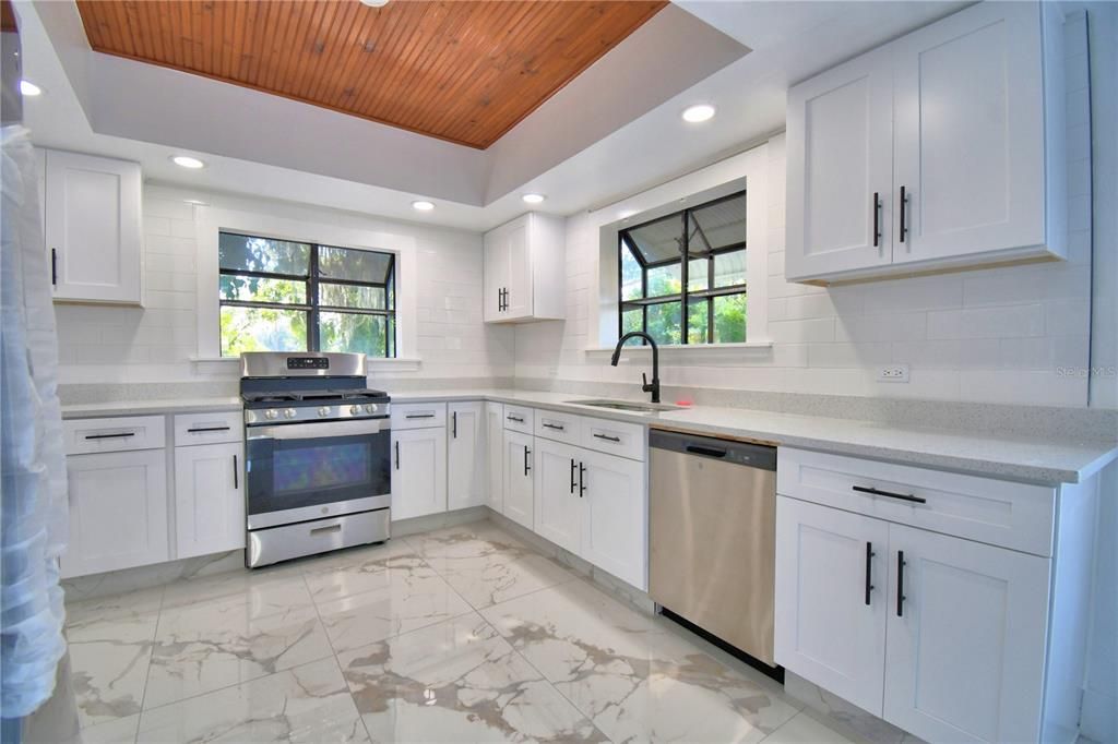 Interior, Kitchen, Marble, Recessed Lighting, Stainless Steel Appliances, Wooden Ceilings