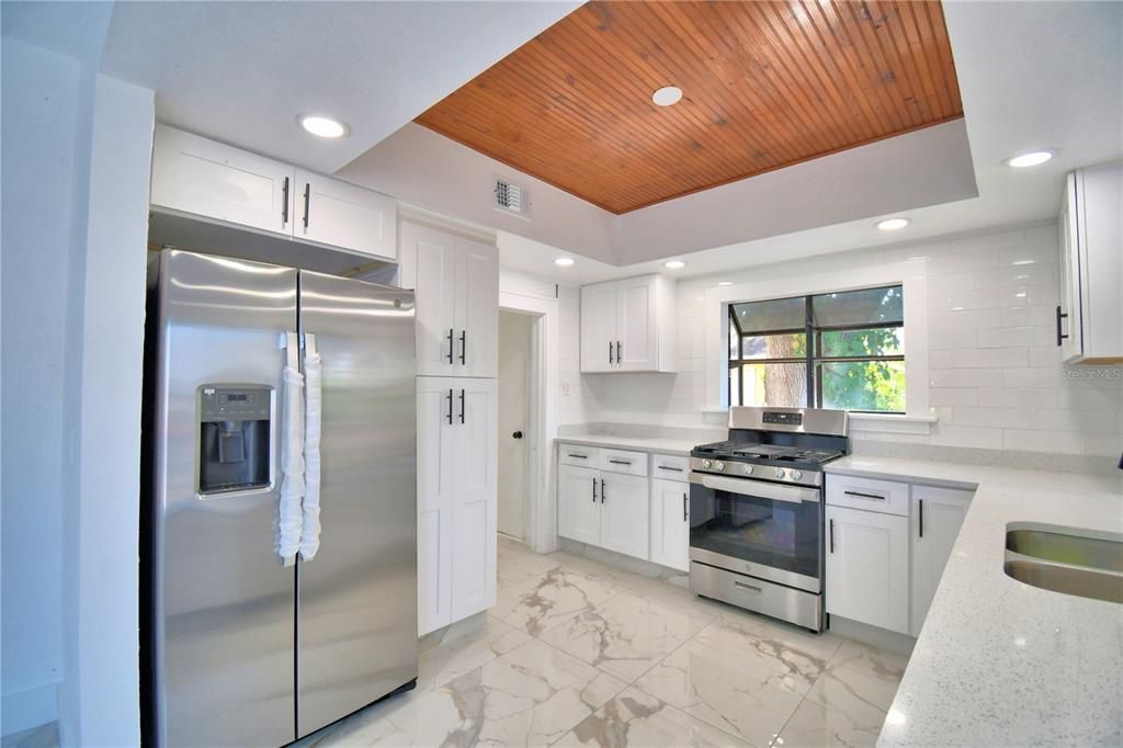 Interior, Kitchen, Marble, Recessed Lighting, Stainless Steel Appliances, Wooden Ceilings