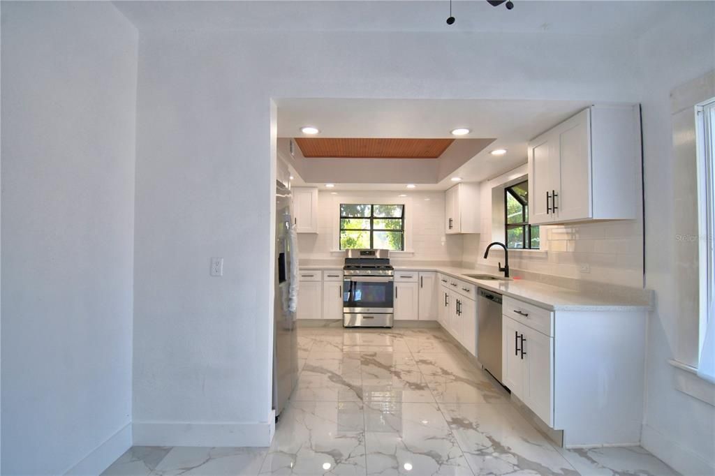 Interior, Kitchen, Marble, Recessed Lighting, Stainless Steel Appliances, Wooden Ceilings