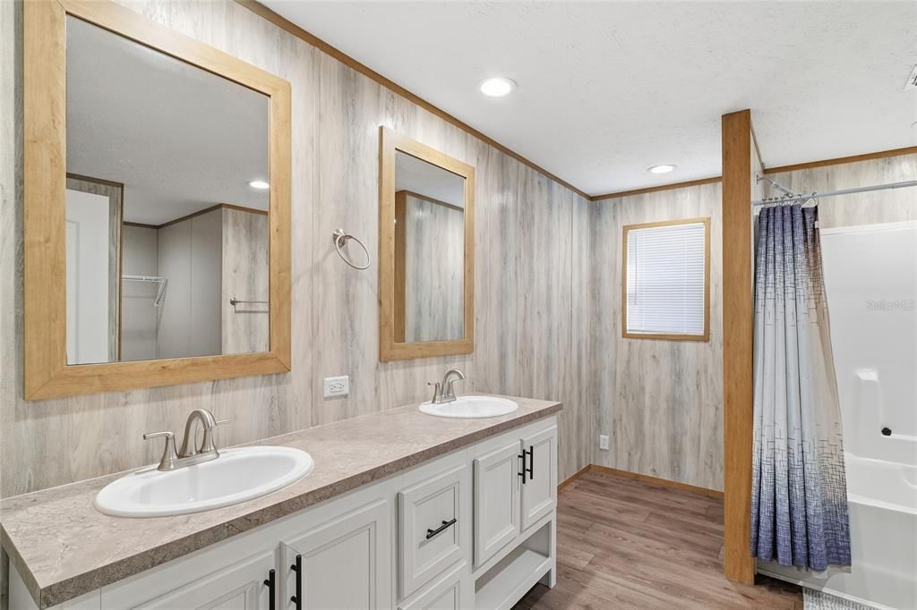 Bathroom, Dual Sink Vanities, Interior, Recessed Lighting, Wood Texture Flooring