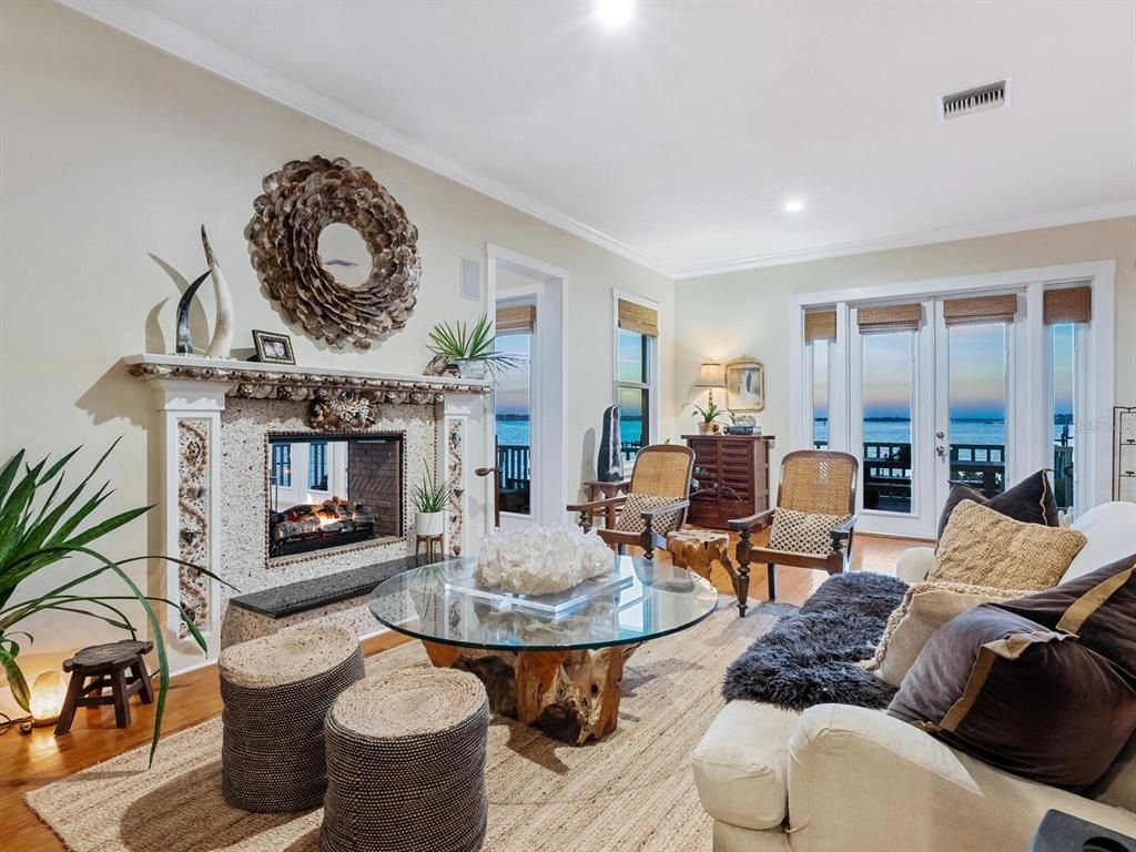 Fireplace, Interior, Living room, Recessed Lighting, Water, Wood Texture Flooring