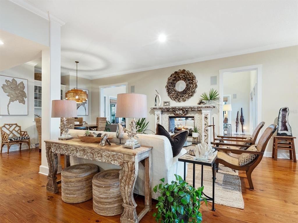 Dining room, Fireplace, Interior, Living room, Pendant Lights, Recessed Lighting, Wood Texture Flooring