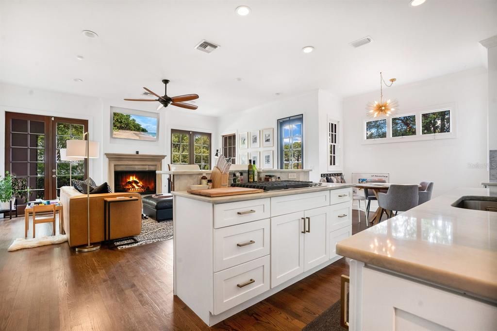 Dining room, Fireplace, Interior, Living room, Pendant Lights, Recessed Lighting, Wood Texture Flooring