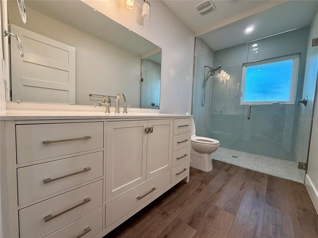 Bathroom, Glass Shower, Interior, Recessed Lighting, Wood Texture Flooring