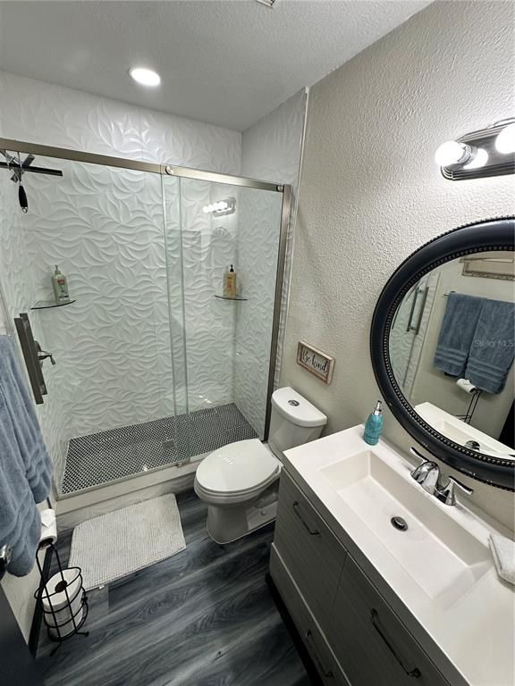 Bathroom, Glass Shower, Interior, Recessed Lighting, Wood Texture Flooring