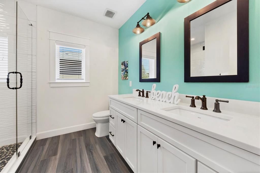 Bathroom, Dual Sink Vanities, Glass Shower, Interior, Wood Texture Flooring