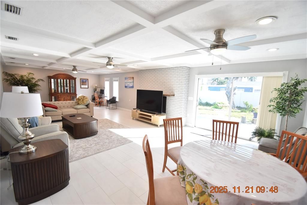 Dining room, Interior, Living room, Recessed Lighting, Stone Walls, Wood Texture Flooring