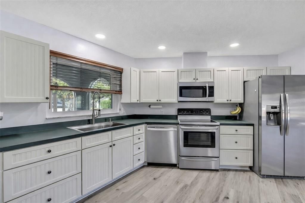 Interior, Kitchen, Recessed Lighting, Stainless Steel Appliances, Wood Texture Flooring