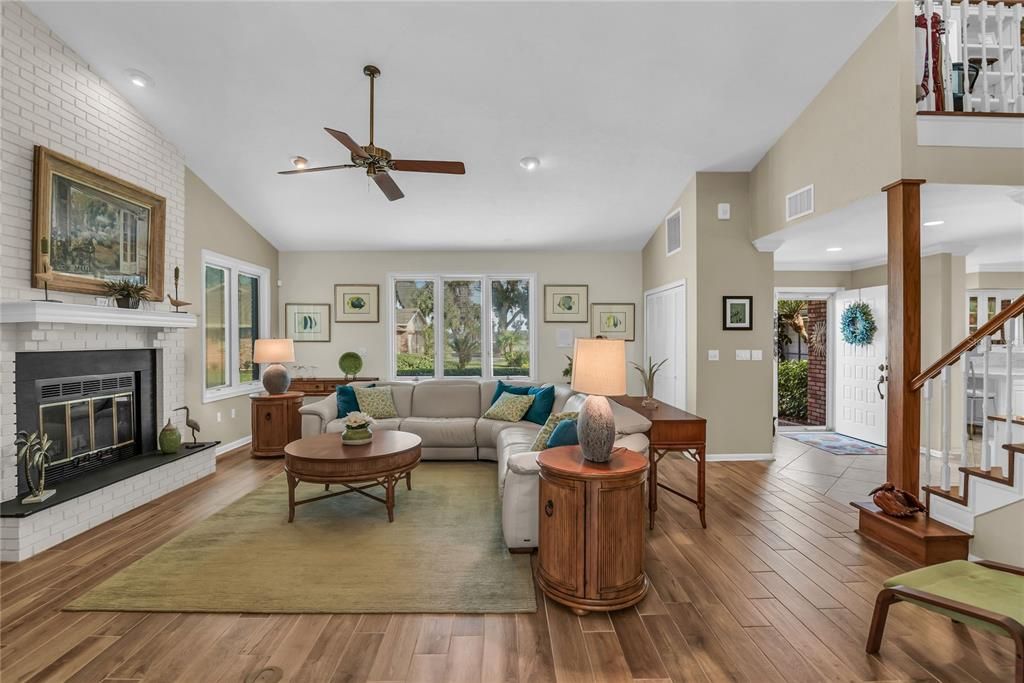 Fireplace, Interior, Living room, Recessed Lighting, Stone Walls, Wood Texture Flooring