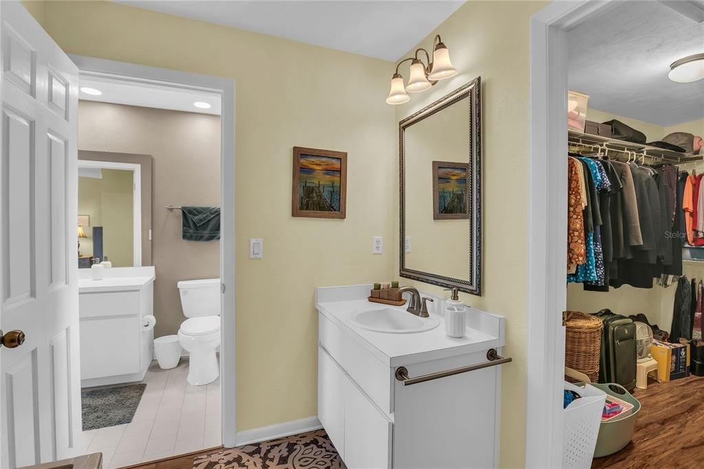 Bathroom, Dual Sink Vanities, Interior, Recessed Lighting, Walk-in Closets, Wood Texture Flooring