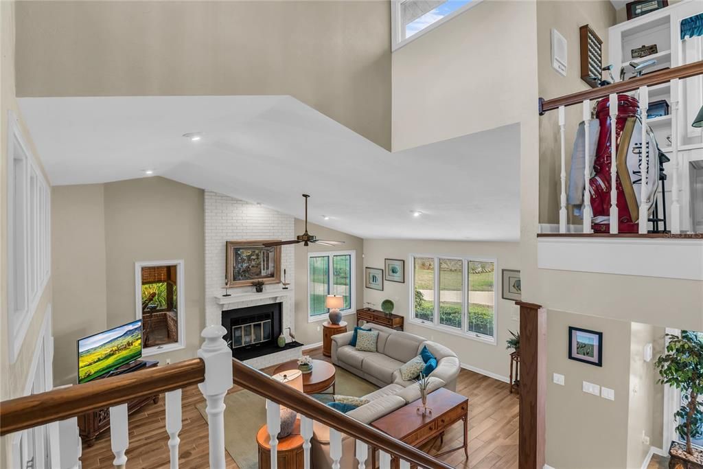 Fireplace, Interior, Living room, Recessed Lighting, Stone Walls, Wood Texture Flooring