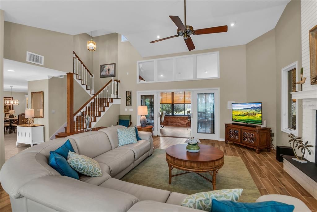 Chandelier, Dining room, Interior, Living room, Pendant Lights, Recessed Lighting, Wood Texture Flooring