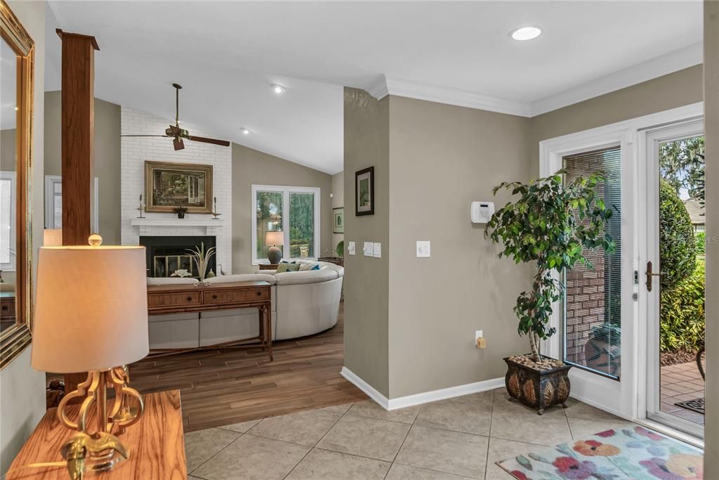 Fireplace, Interior, Living room, Recessed Lighting, Stone Walls, Wood Texture Flooring