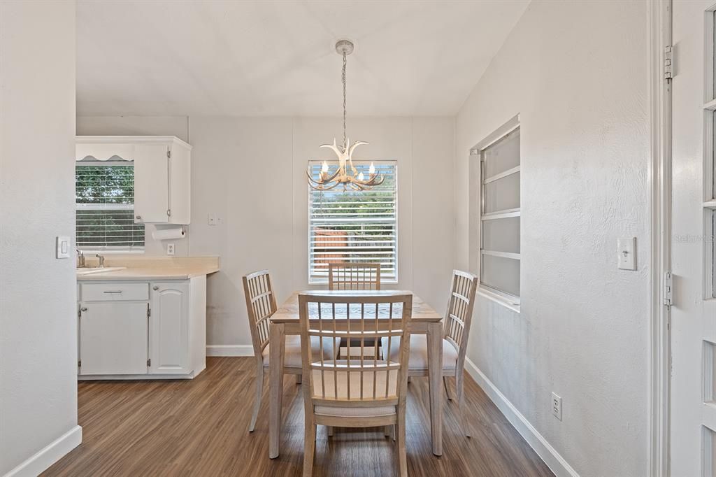 Chandelier, Dining room, Interior, Pendant Lights, Wood Texture Flooring