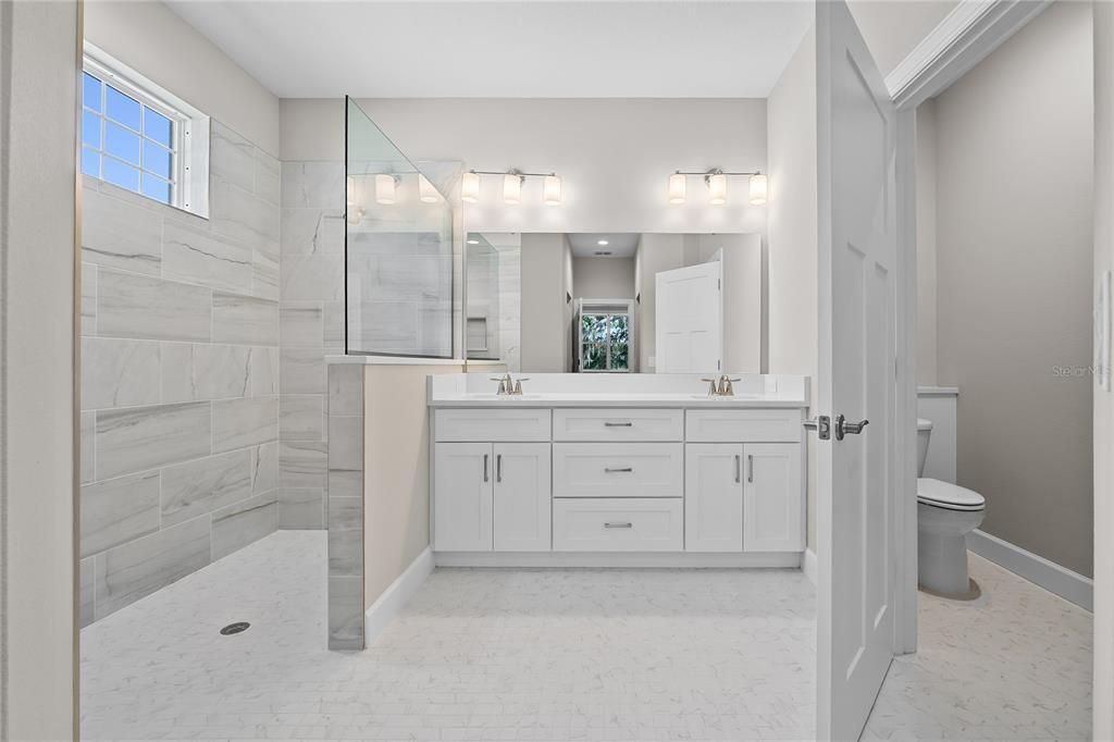 Bathroom, Dual Sink Vanities, Glass Shower, Interior, Marble, Marble Walls