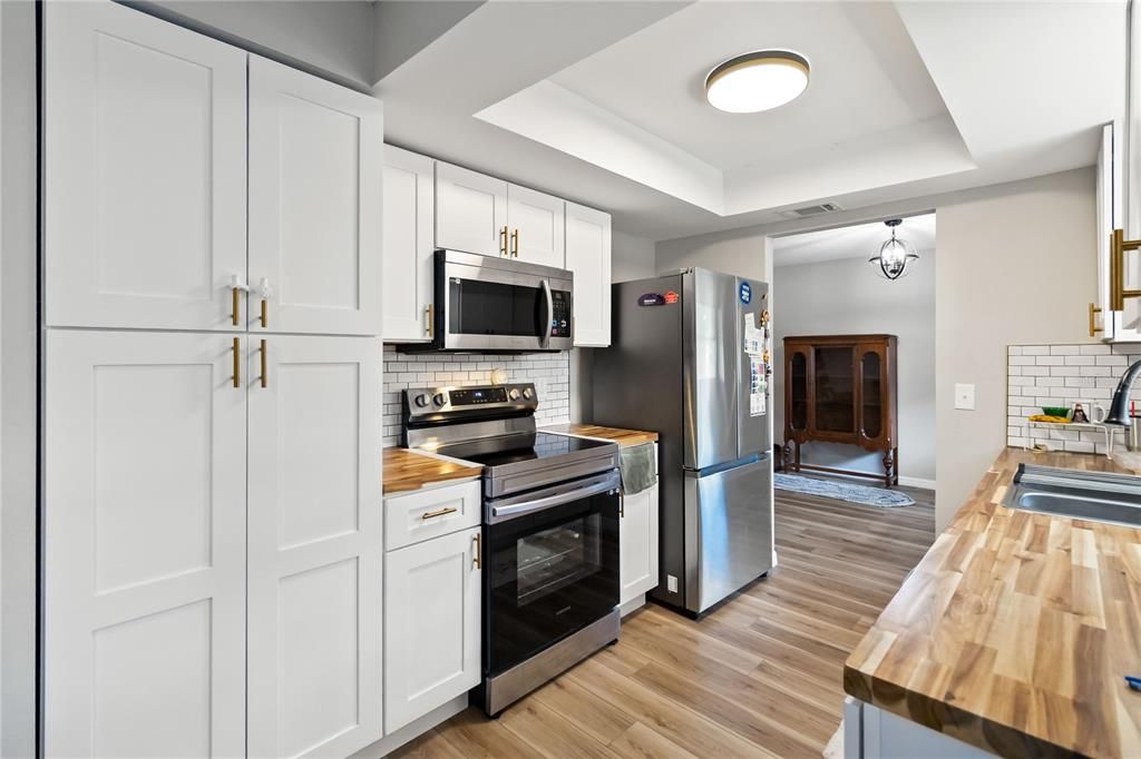 Chandelier, Interior, Kitchen, Stainless Steel Appliances, Wood Texture Flooring