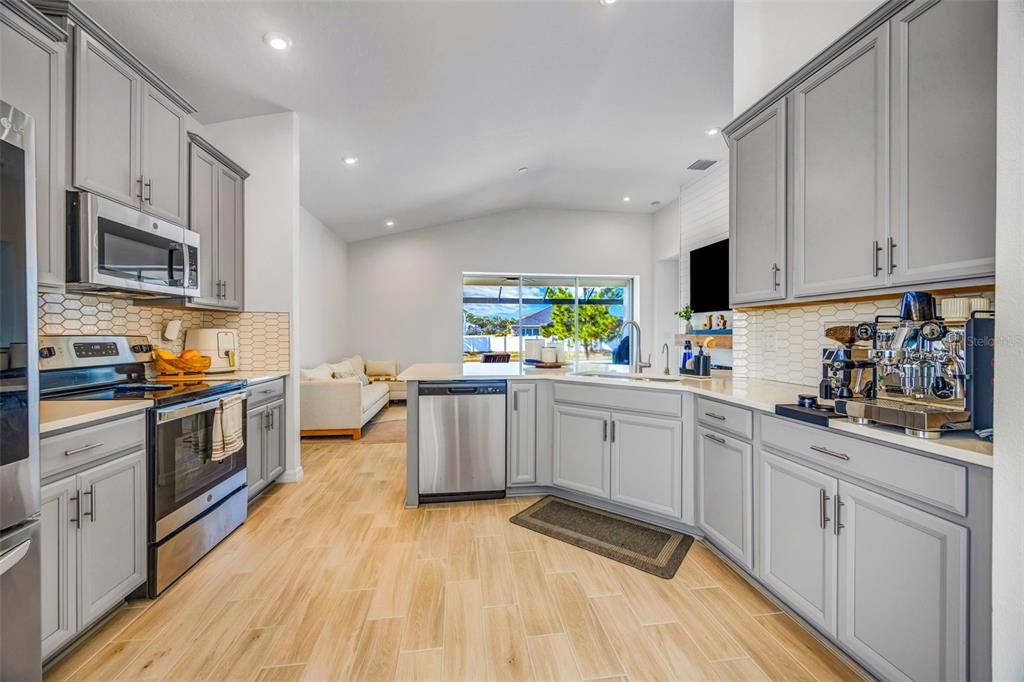 Interior, Kitchen, Recessed Lighting, Stainless Steel Appliances, Wood Texture Flooring