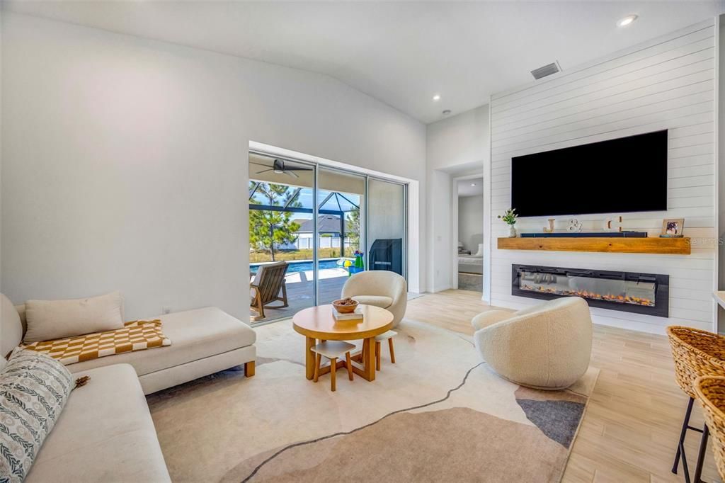 Fireplace, Interior, Living room, Recessed Lighting, Wood Texture Flooring