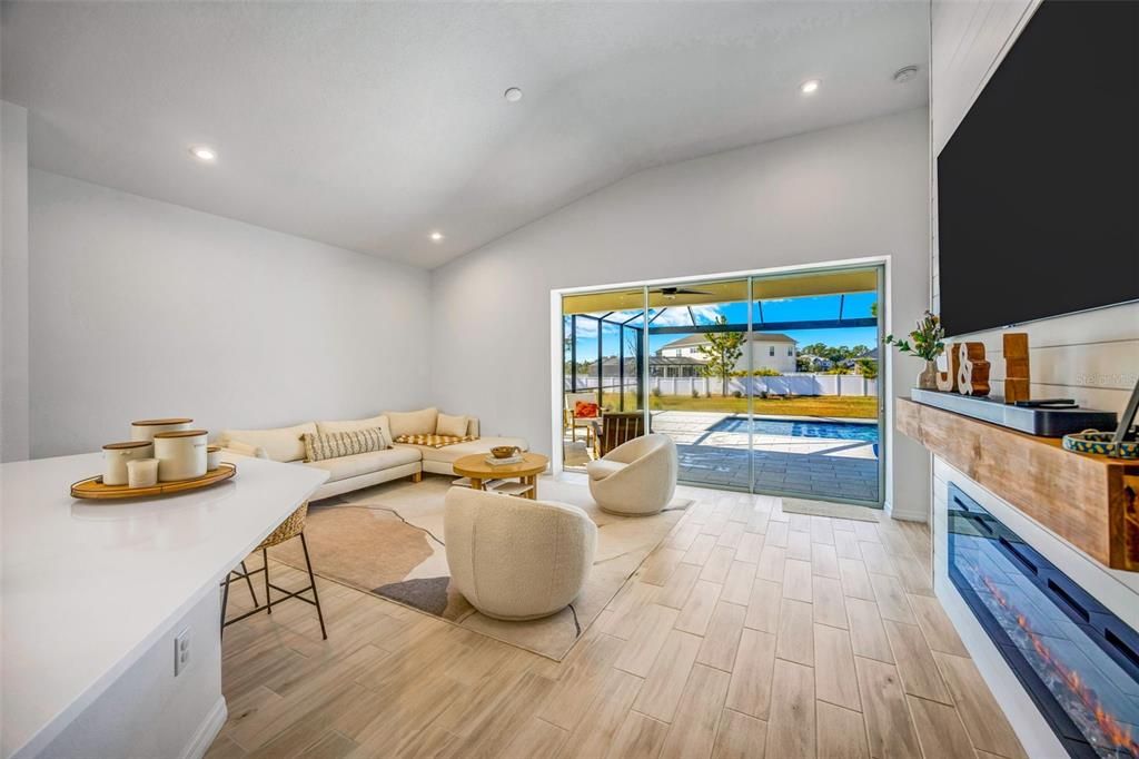 Fireplace, Interior, Living room, Recessed Lighting, Wood Texture Flooring