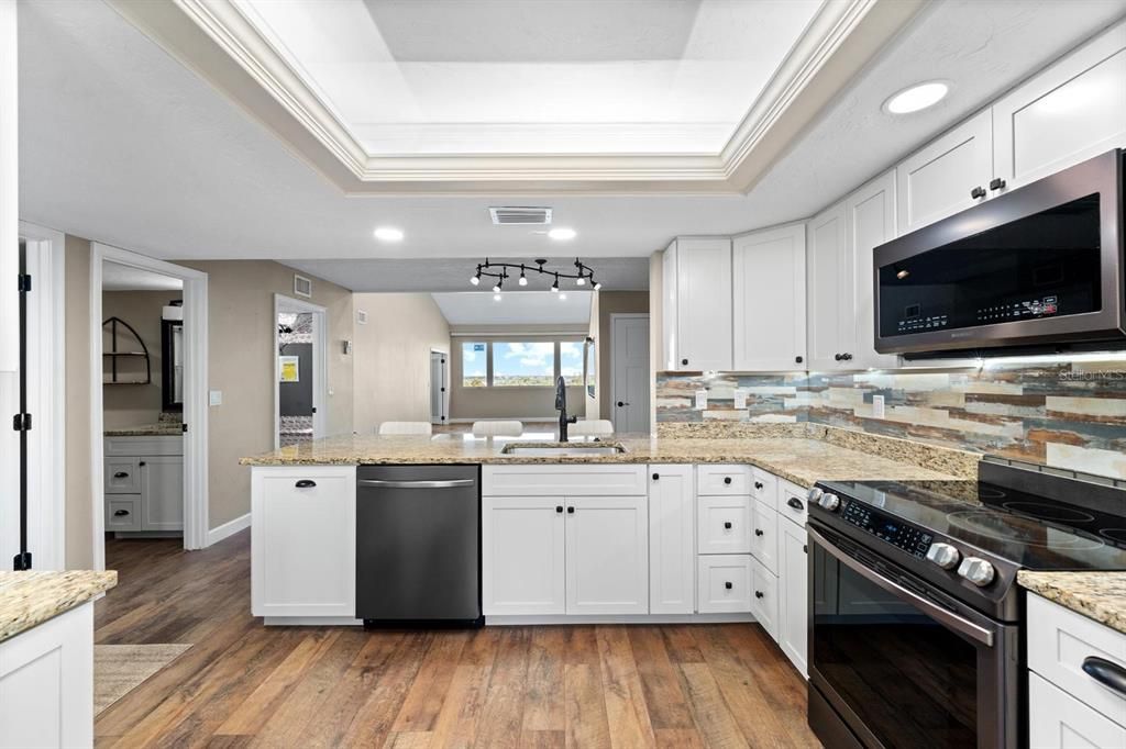 Interior, Kitchen, Recessed Lighting, Stainless Steel Appliances, Wood Texture Flooring