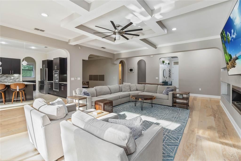 Fireplace, Interior, Kitchen, Living room, Recessed Lighting, Wood Texture Flooring