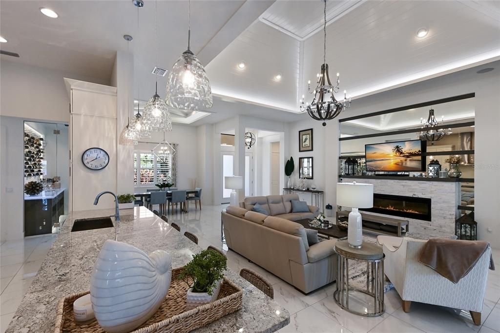 Chandelier, Dining room, Fireplace, Interior, Living room, Marble, Pendant Lights, Recessed Lighting