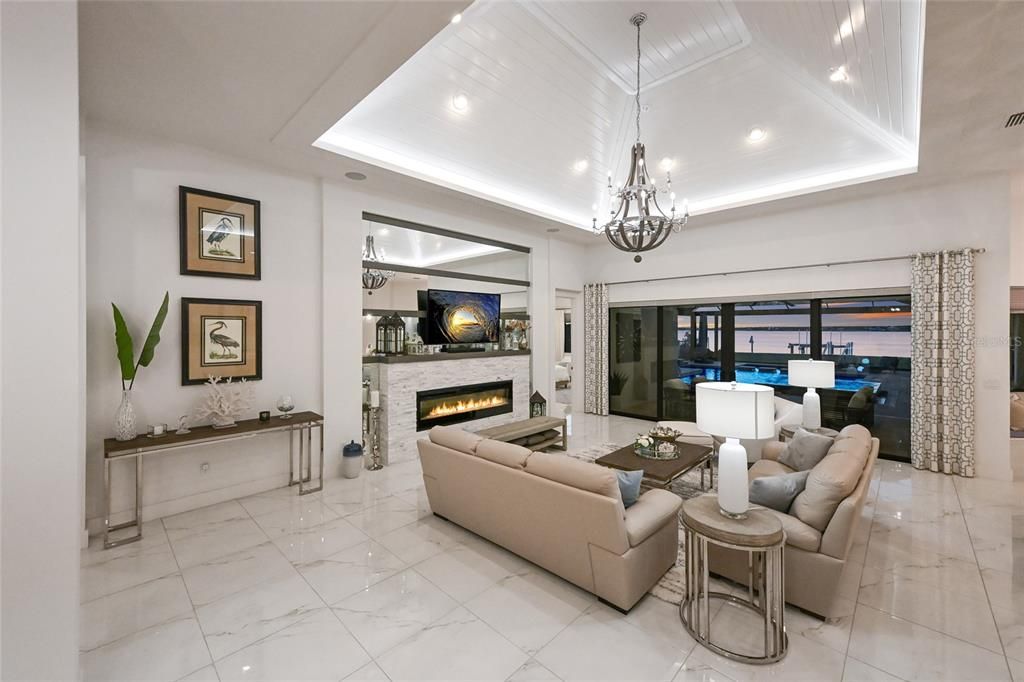 Chandelier, Fireplace, Interior, Living room, Marble, Pendant Lights, Recessed Lighting, Water