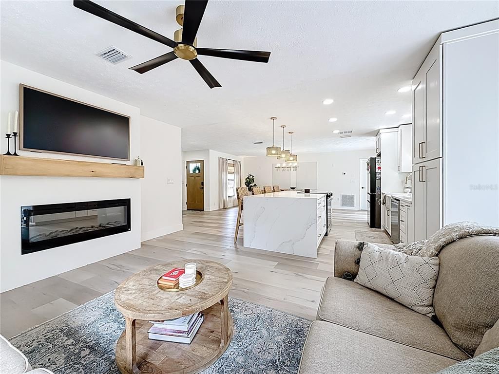 Fireplace, Interior, Kitchen, Pendant Lights, Recessed Lighting, Wood Texture Flooring