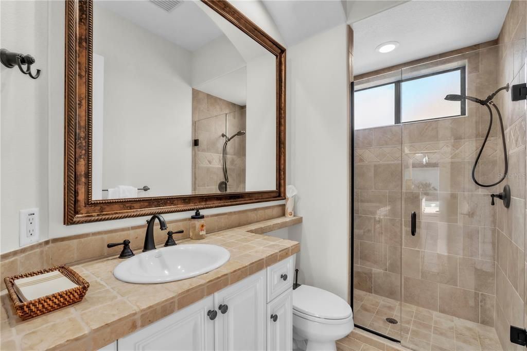 Bathroom, Glass Shower, Interior, Recessed Lighting, Tile Countertops