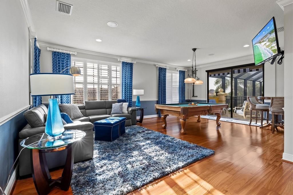 Billiard Table, Game Room, Interior, Living room, Pendant Lights, Recessed Lighting, Wood Texture Flooring