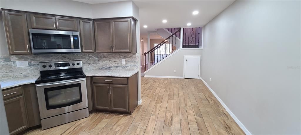 Interior, Kitchen, Recessed Lighting, Stainless Steel Appliances, Wood Texture Flooring