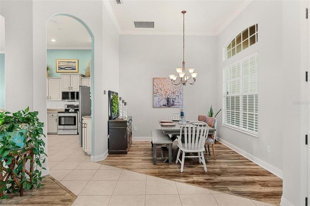 Chandelier, Dining room, Interior, Kitchen, Pendant Lights, Recessed Lighting, Stainless Steel Appliances, Wood Texture Flooring