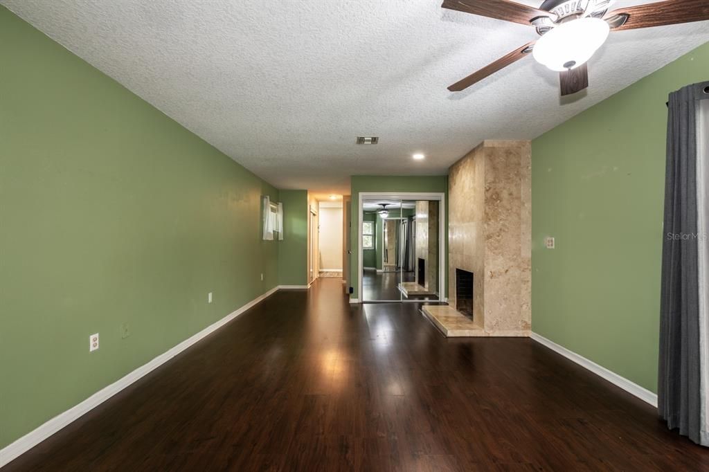 Empty room, Fireplace, Interior, Recessed Lighting, Wood Texture Flooring