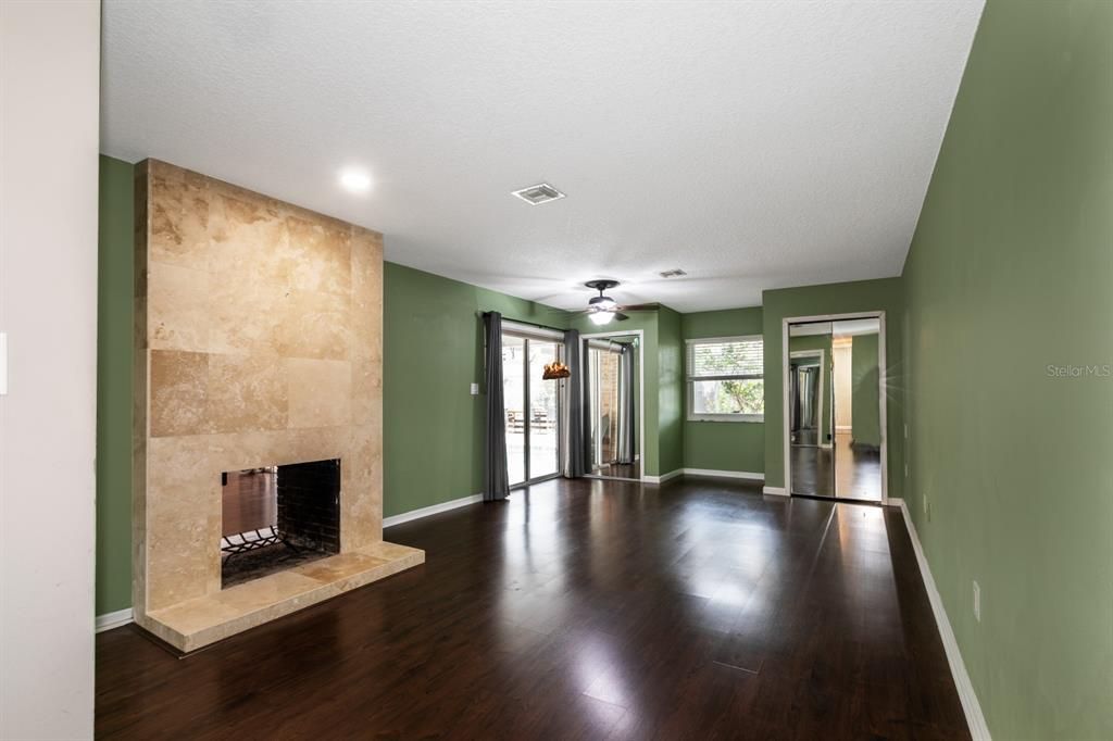 Empty room, Fireplace, Interior, Recessed Lighting, Wood Texture Flooring